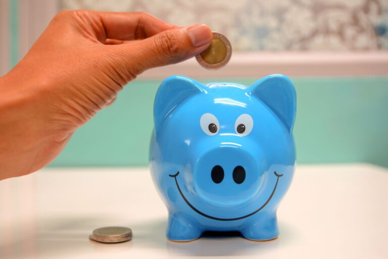 Side-by-side comparison of a checking vs savings account showing features and when to use each type of bank account